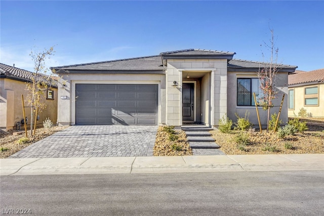 view of front of home with a garage