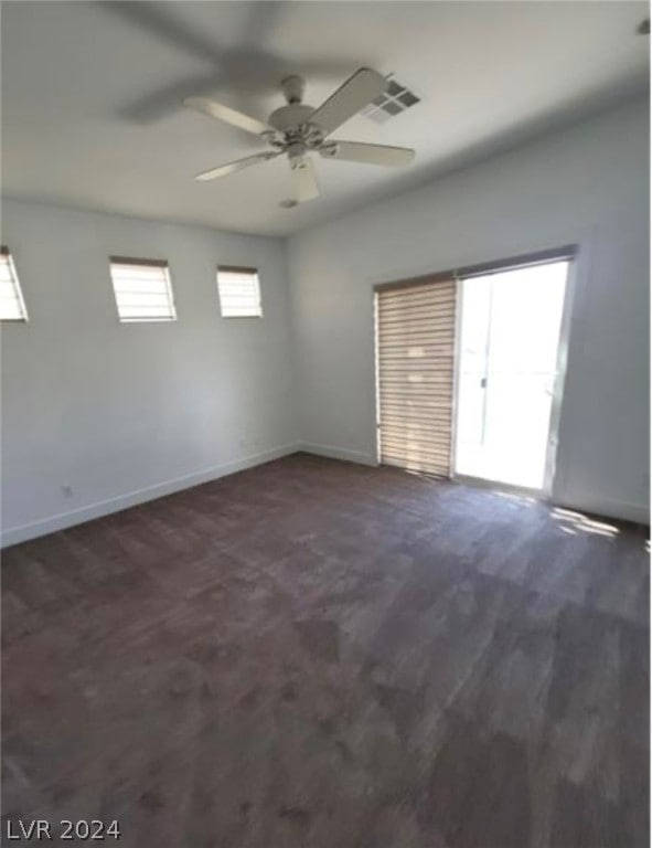 spare room with ceiling fan