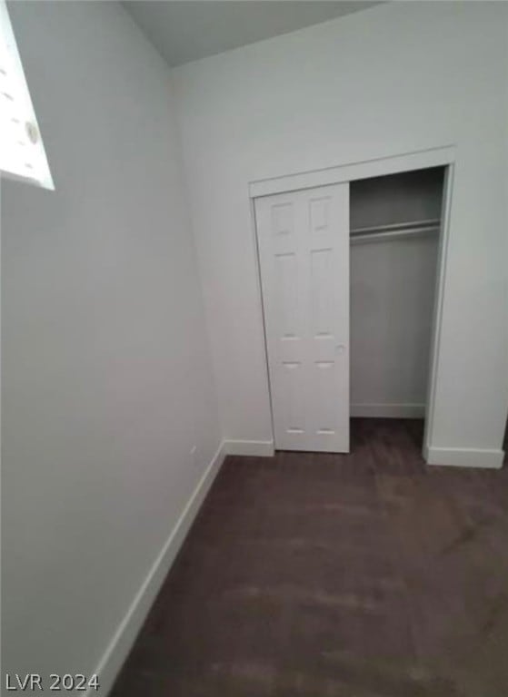 unfurnished bedroom featuring a closet