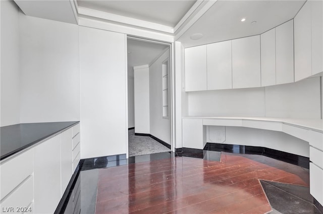 unfurnished dining area featuring hardwood / wood-style floors