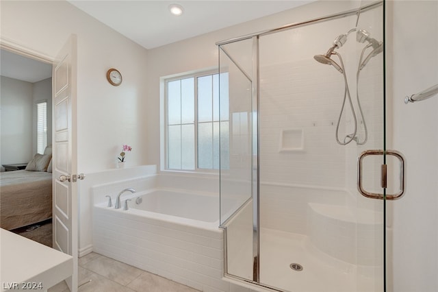 bathroom with tile floors and plus walk in shower