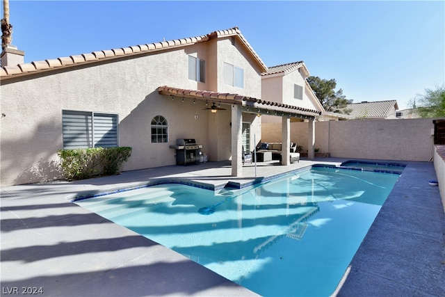 view of pool featuring a patio, a pergola, and a grill