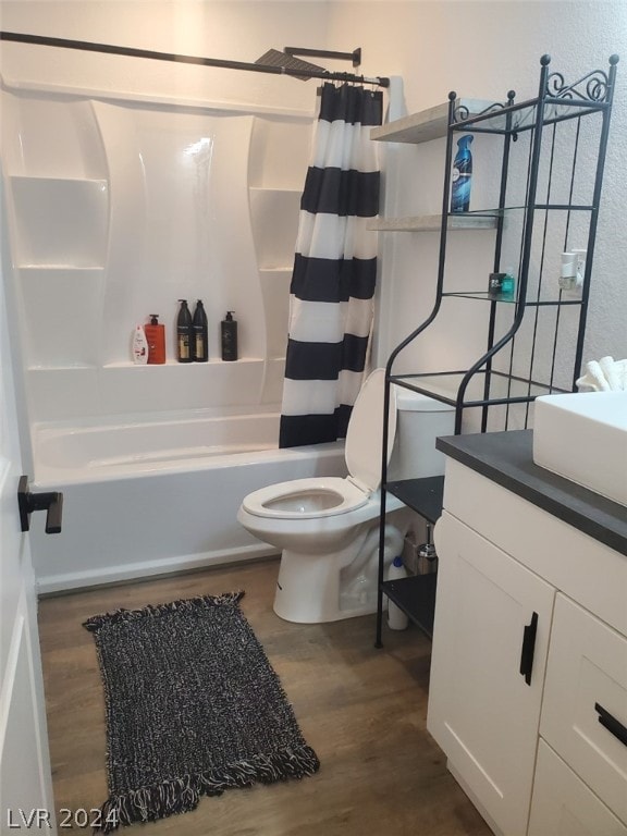 full bathroom with shower / bathtub combination with curtain, toilet, vanity, and wood-type flooring