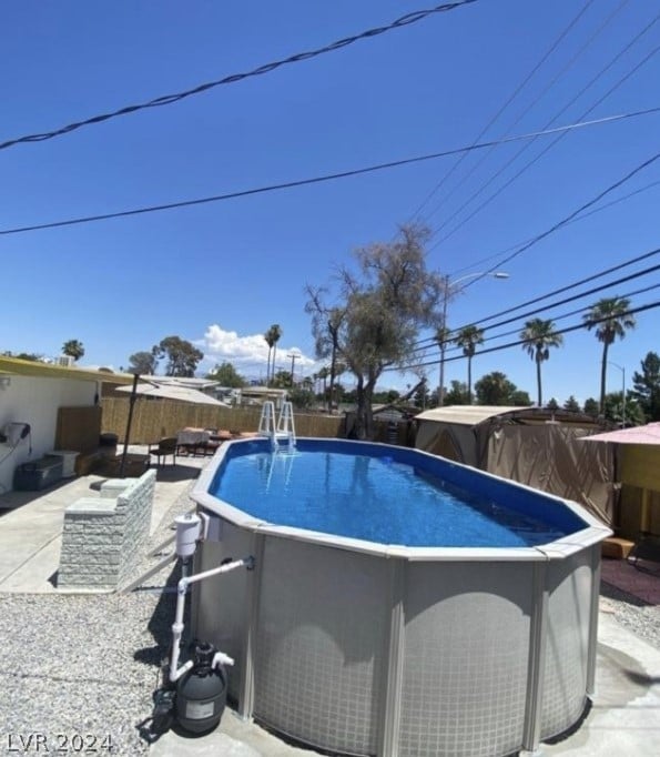 view of pool with a patio