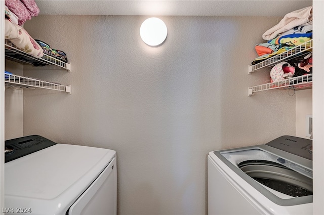 laundry area with washer and clothes dryer