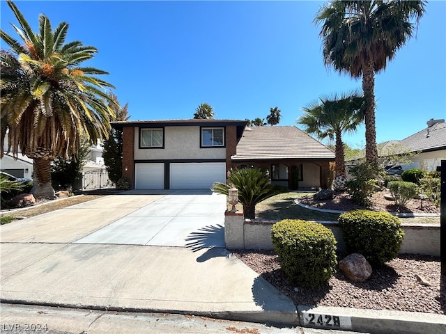 front of property with a garage