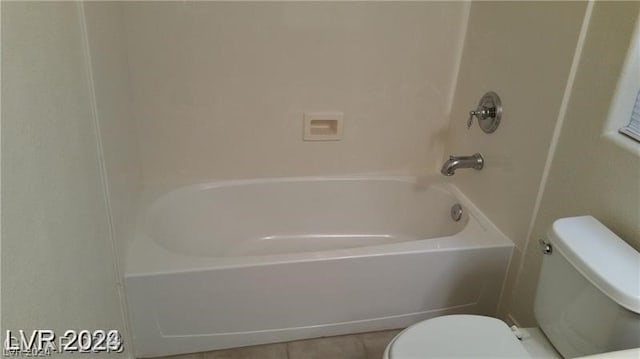 bathroom with  shower combination, tile flooring, and toilet