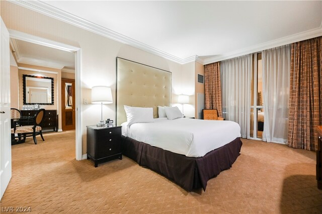 carpeted bedroom featuring crown molding