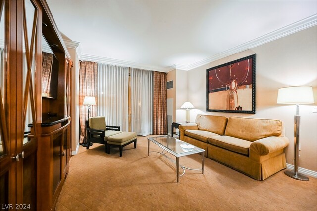 carpeted living room featuring ornamental molding