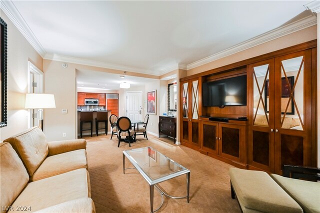 living room with crown molding and light carpet