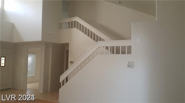 stairs with a high ceiling