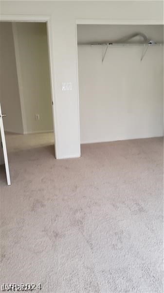 unfurnished bedroom with carpet floors