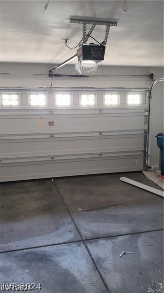 garage featuring a garage door opener