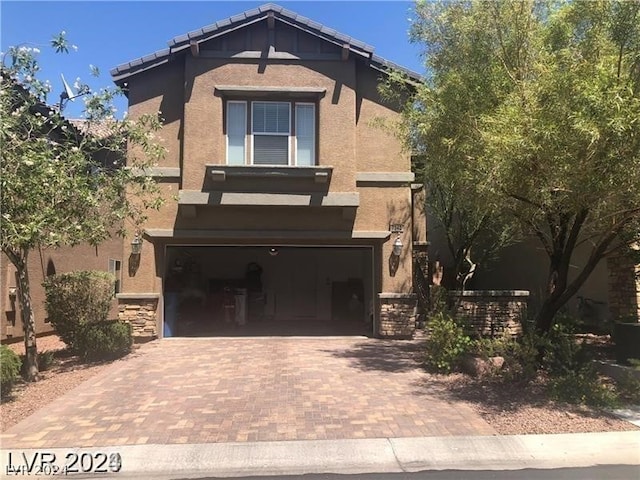 view of front of home featuring a garage