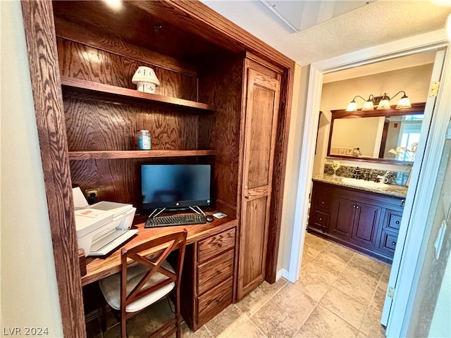 tiled home office with sink