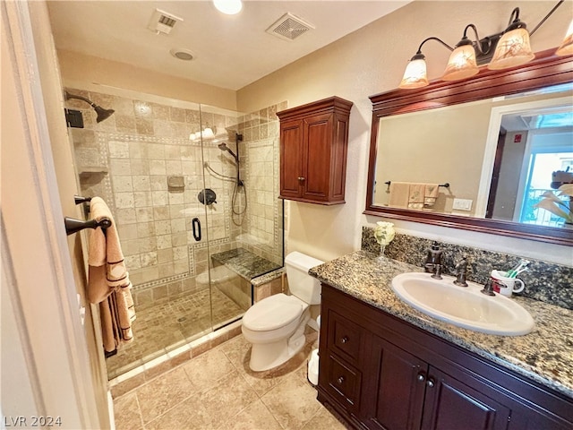 bathroom featuring walk in shower, tile floors, toilet, and oversized vanity