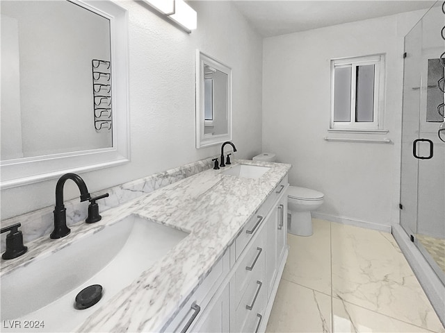 bathroom with tile patterned flooring, toilet, vanity, and a shower with shower door