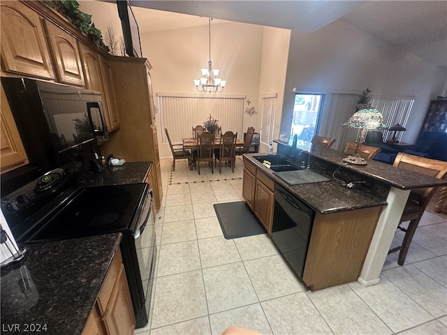 kitchen with an inviting chandelier, light tile flooring, a kitchen bar, black appliances, and high vaulted ceiling