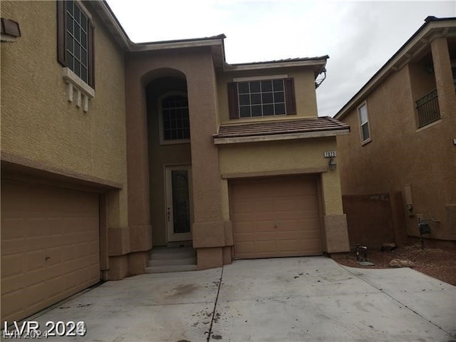 view of front of home featuring a garage