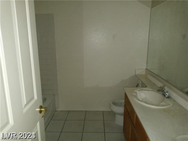 full bathroom featuring large vanity, shower / bathtub combination, tile floors, and toilet