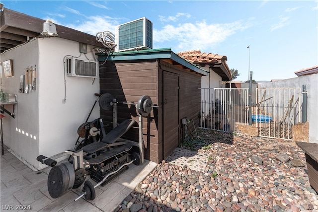 exterior space with an AC wall unit