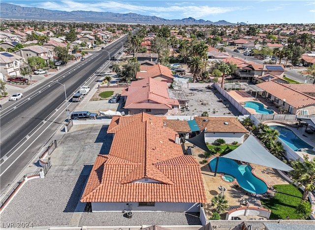 drone / aerial view featuring a mountain view