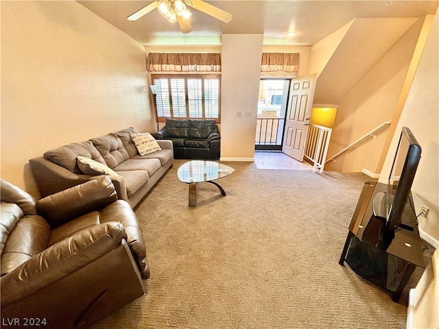 living room with light colored carpet and ceiling fan