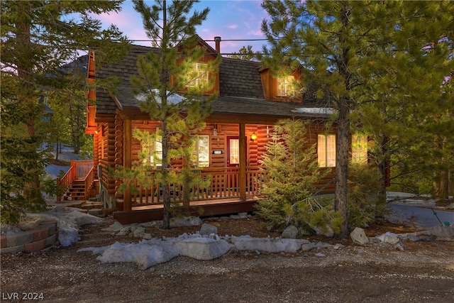 cabin featuring a wooden deck