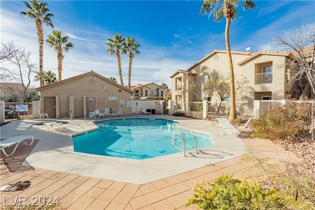 view of pool featuring a patio area