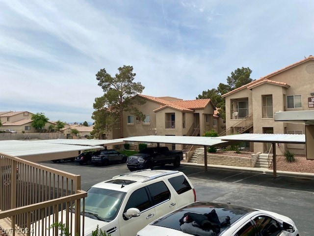 view of front of house with a carport