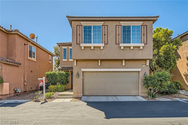 view of front property with a garage