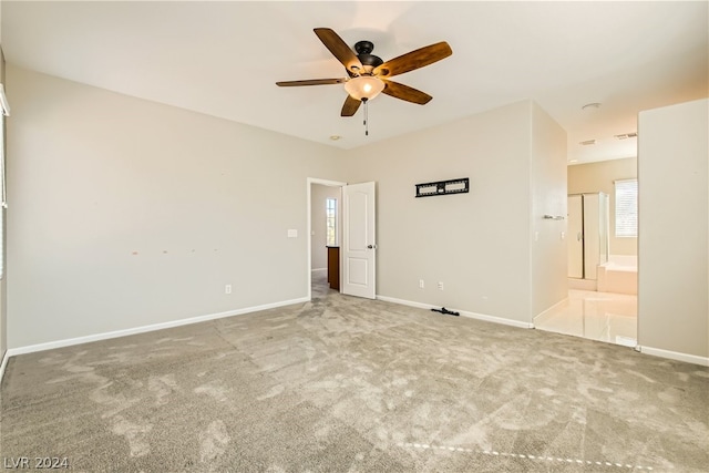 unfurnished room featuring carpet flooring and ceiling fan