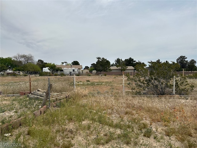 view of yard with a rural view