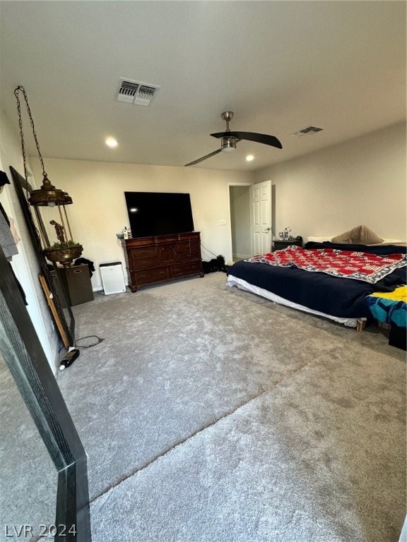 carpeted bedroom featuring ceiling fan