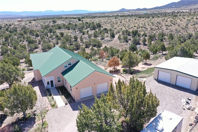 drone / aerial view featuring a mountain view