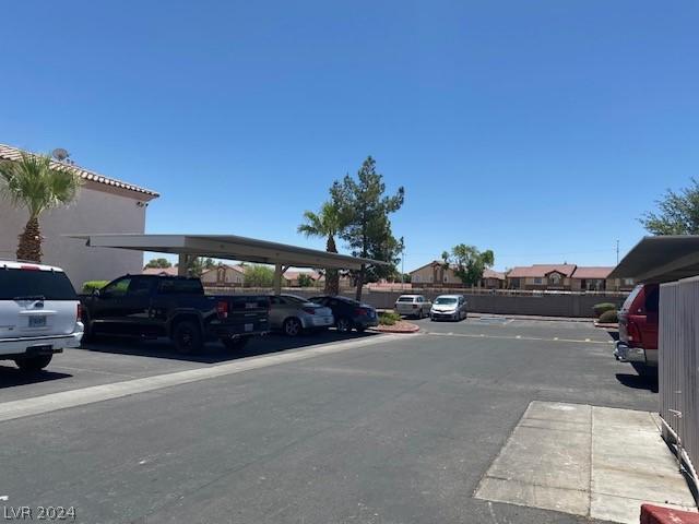 view of car parking featuring a carport