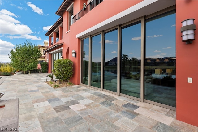 view of patio / terrace with a balcony