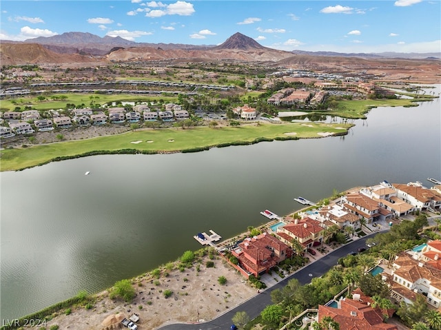 aerial view featuring a water and mountain view