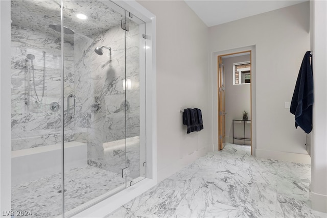 bathroom featuring tile flooring and a shower with shower door