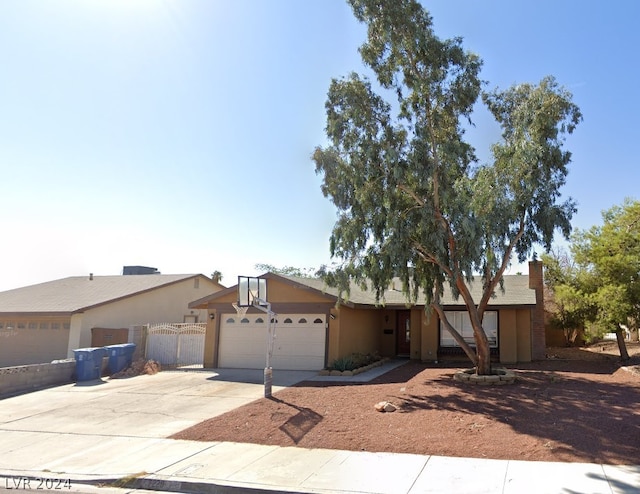 single story home with a garage