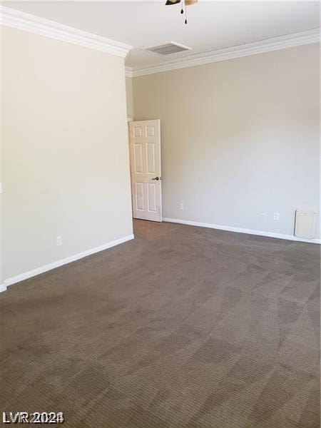 carpeted empty room featuring ornamental molding and ceiling fan