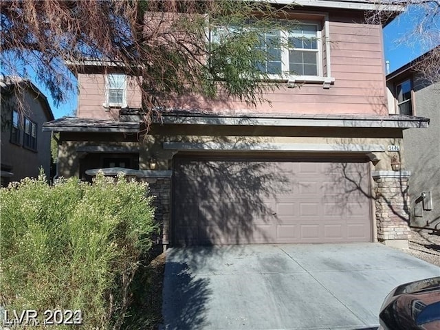 view of front of house with a garage