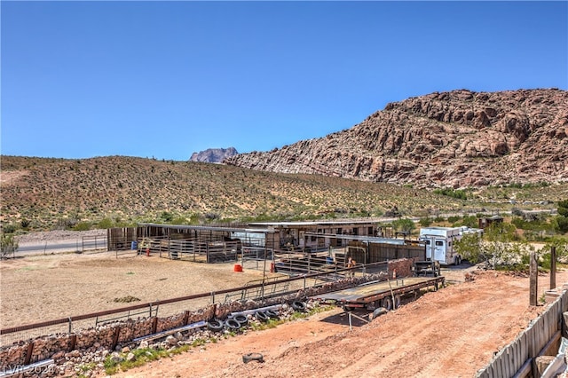 view of mountain feature with a rural view