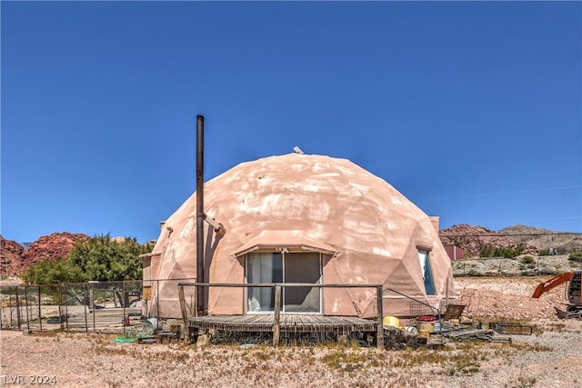 view of outdoor structure with a mountain view