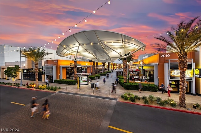 view of outdoor building at dusk