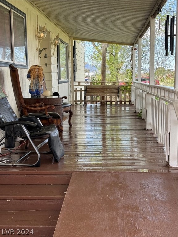 wooden terrace with covered porch