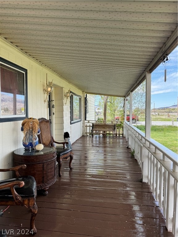 deck with covered porch