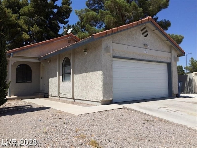 exterior space featuring a garage