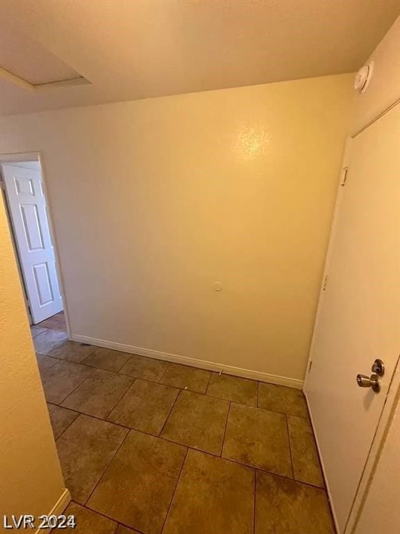 spare room featuring tile flooring