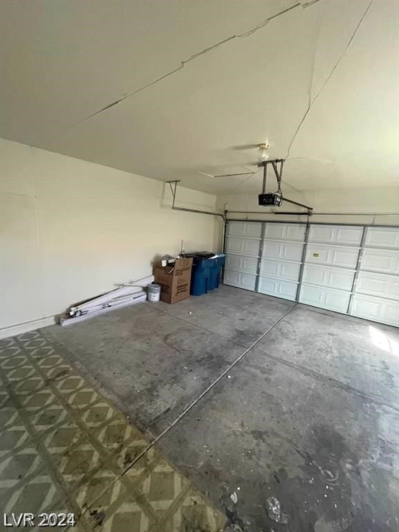 garage featuring a garage door opener